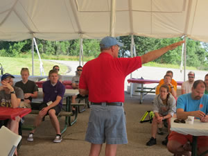 Jeff Morehouse giving instructions at the morning meeting